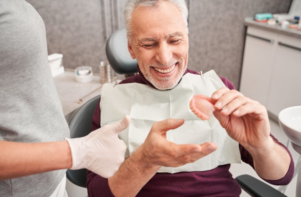 Patient smiling at their denture consultation appointment.